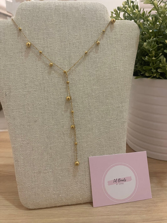Golden Droplet Lariat